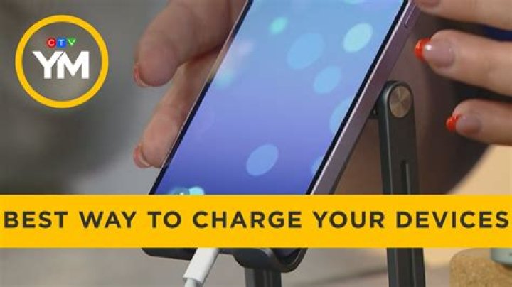 Can I charge my portable charger and phone at the same time?