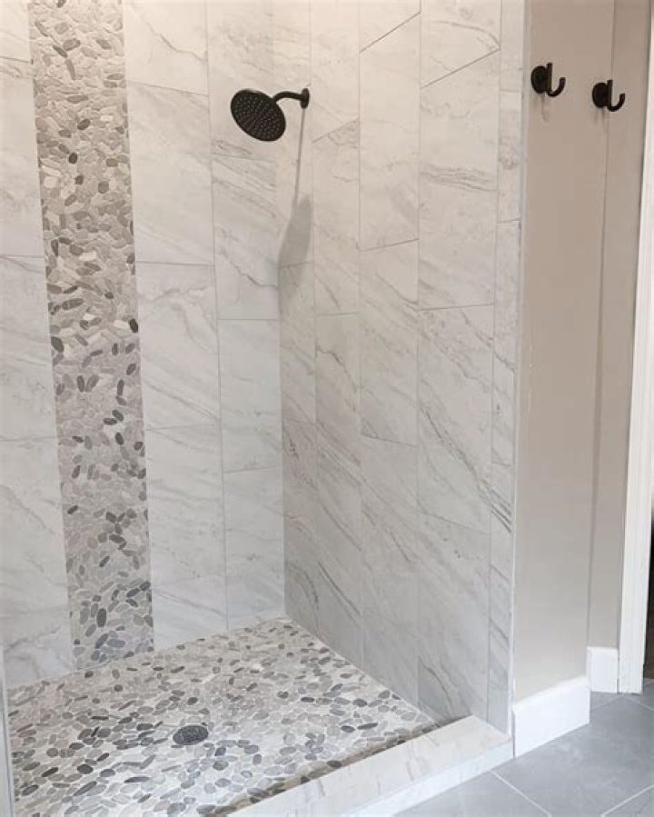 Can limestone tile be used in a shower?