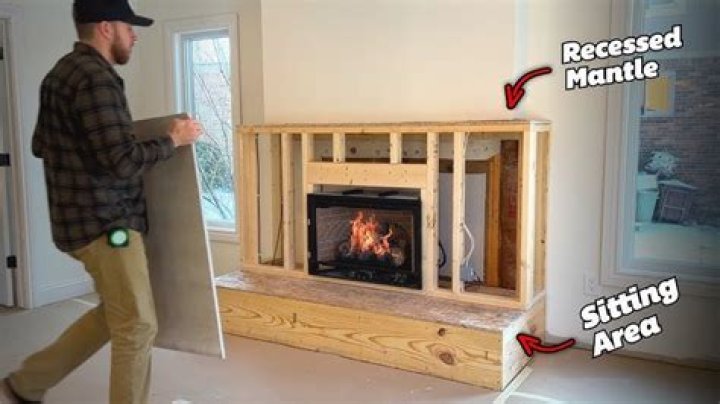 How can I make my wood fireplace more efficient