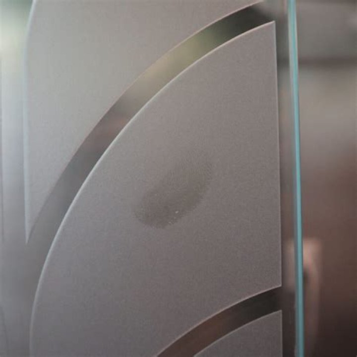 How do you keep fingerprints off glass tables?