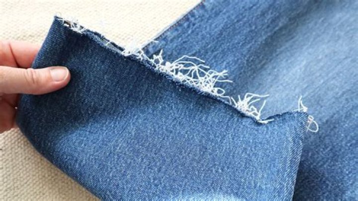 How do you make homemade tattered jeans?
