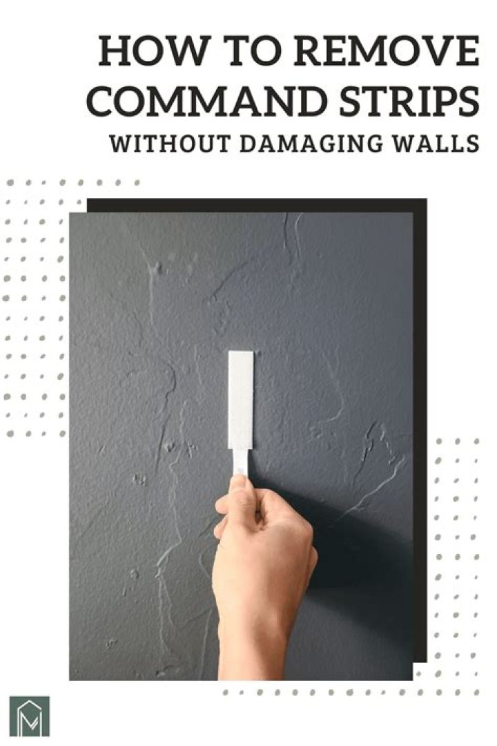 How do you remove command strips from a wall without peeling paint?
