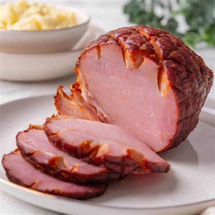 How is smoked ham made?