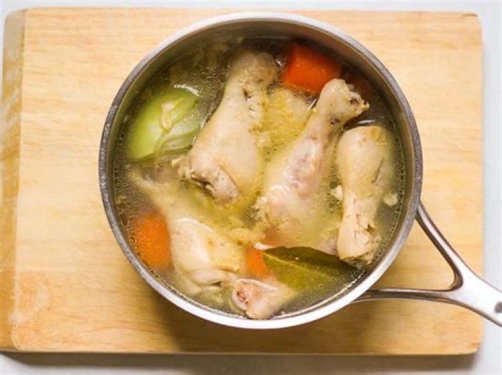 How long do you boil chicken legs before grilling?