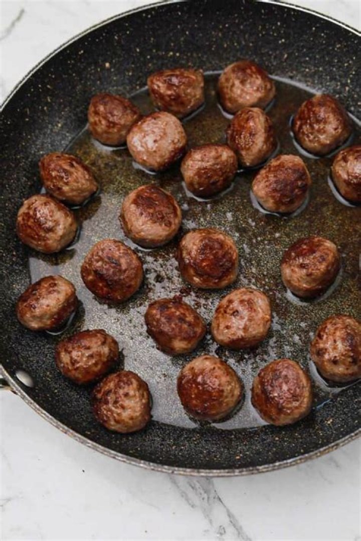 How long do you brown meatballs before putting in sauce?