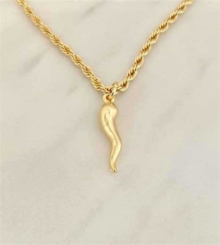 What does the horn pendant mean