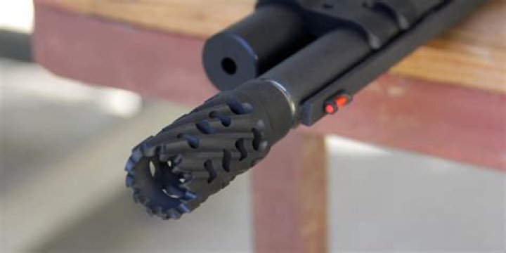 What is a breaching barrel on a shotgun for?