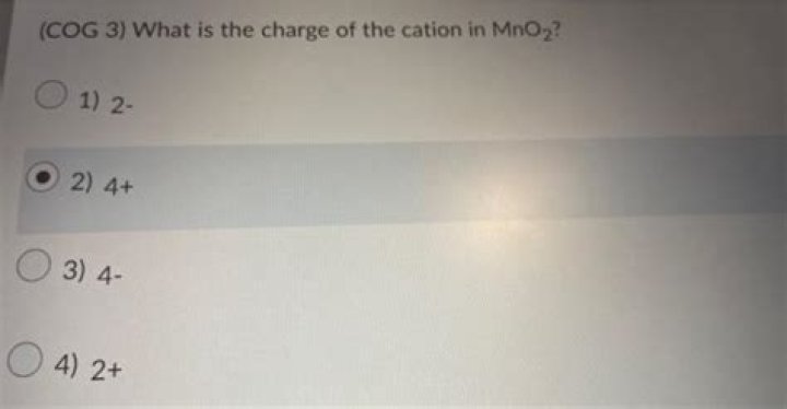 What is the charge of the cation in MnO2?