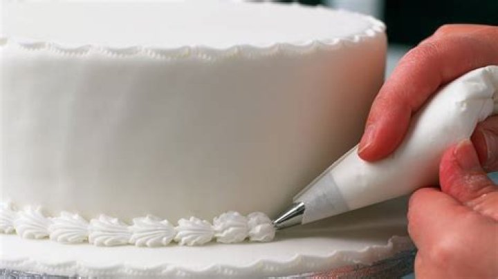 What is the purpose of icing in a cake?