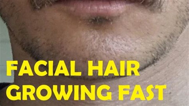 What way does facial hair grow?