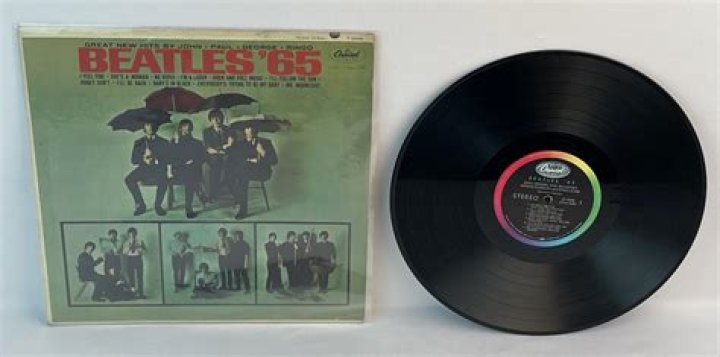 Why did Capitol Records decline to issue the Beatles first singles in the United States